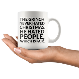 The Grinch Never Hated Christmas Coffee Mug