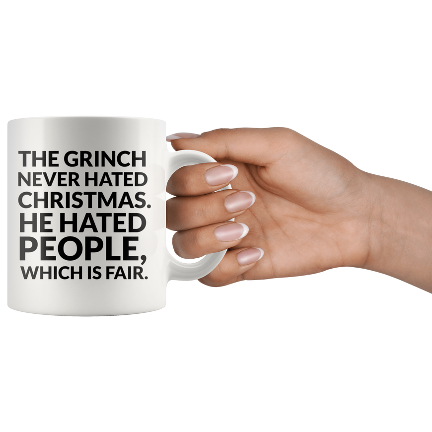 The Grinch Never Hated Christmas Coffee Mug