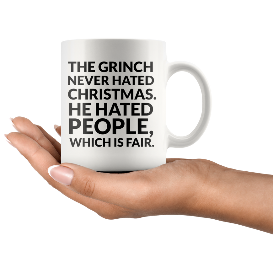 The Grinch Never Hated Christmas Coffee Mug